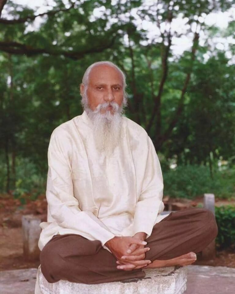 Brahmarshi Pitamaha Patriji seated in meditation beneath trees